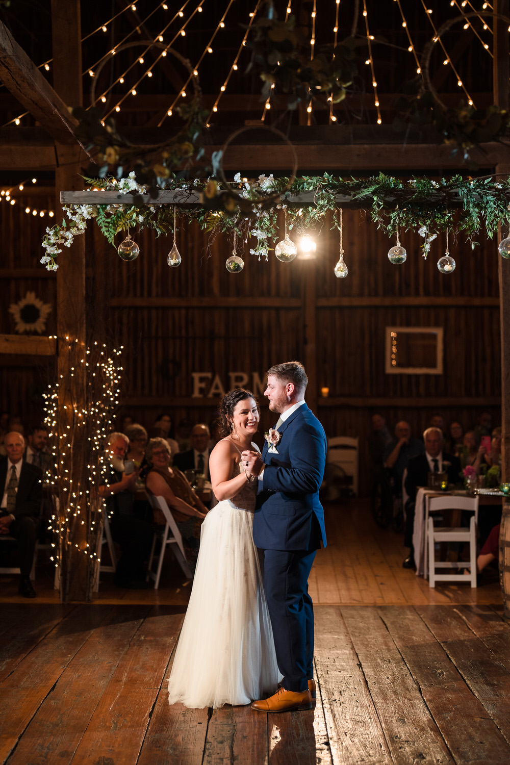 Romantic moment of the couple dancing together during their reception.