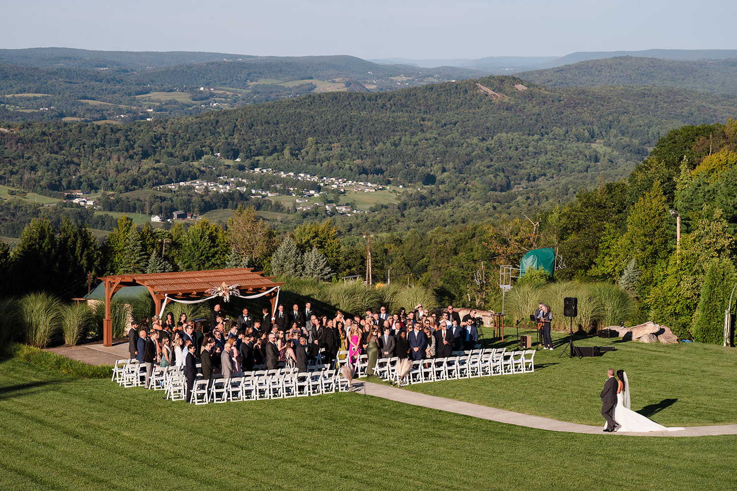 Outdoor hilltop wedding ceremony overlooking the Blue Mountain range at Blue Mountain Resort in Palmerton, PA