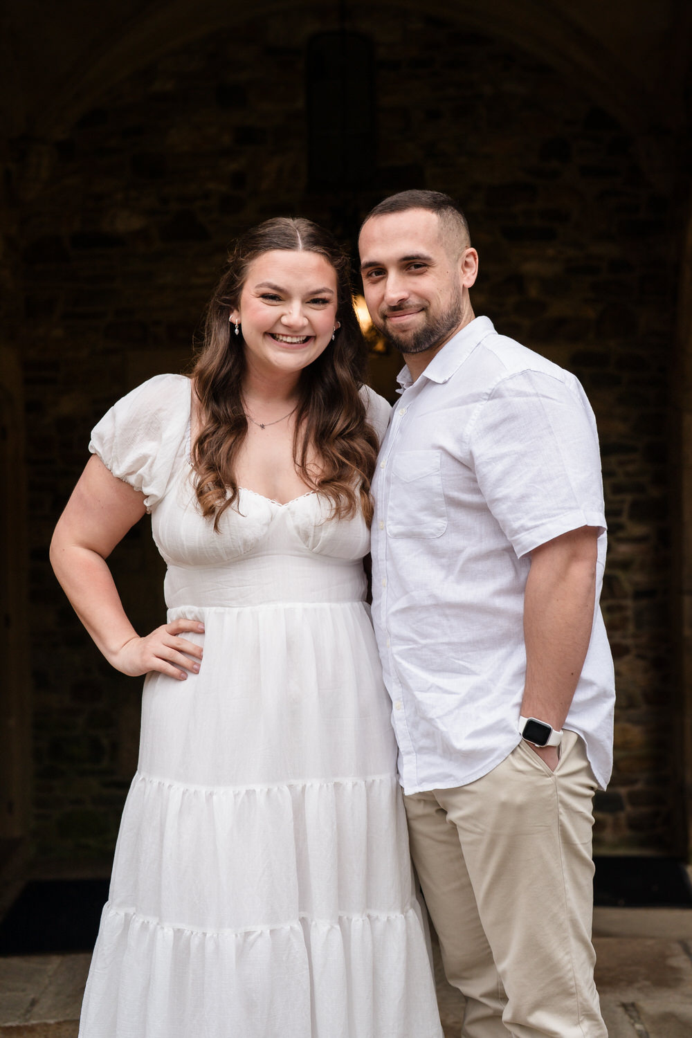 Full-length portrait of couple standing together during engagement session