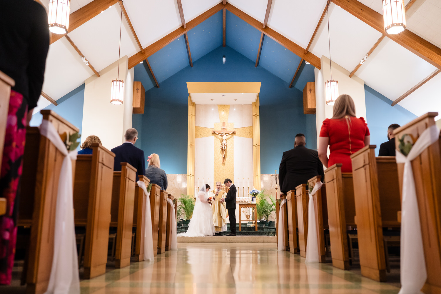 Bride and groom at altar during church wedding ceremony